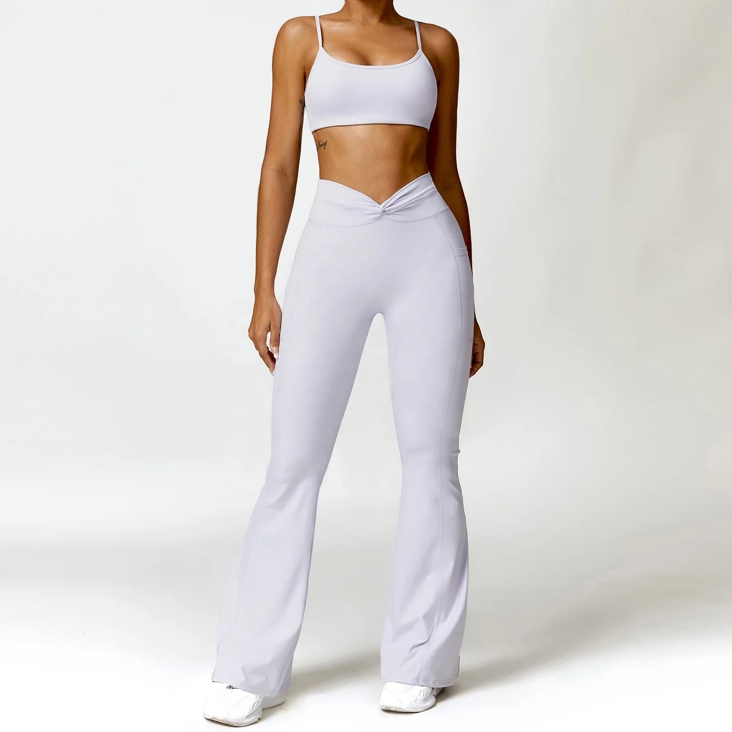 Soft Grey Solid Sports Bra with Back Twist Design