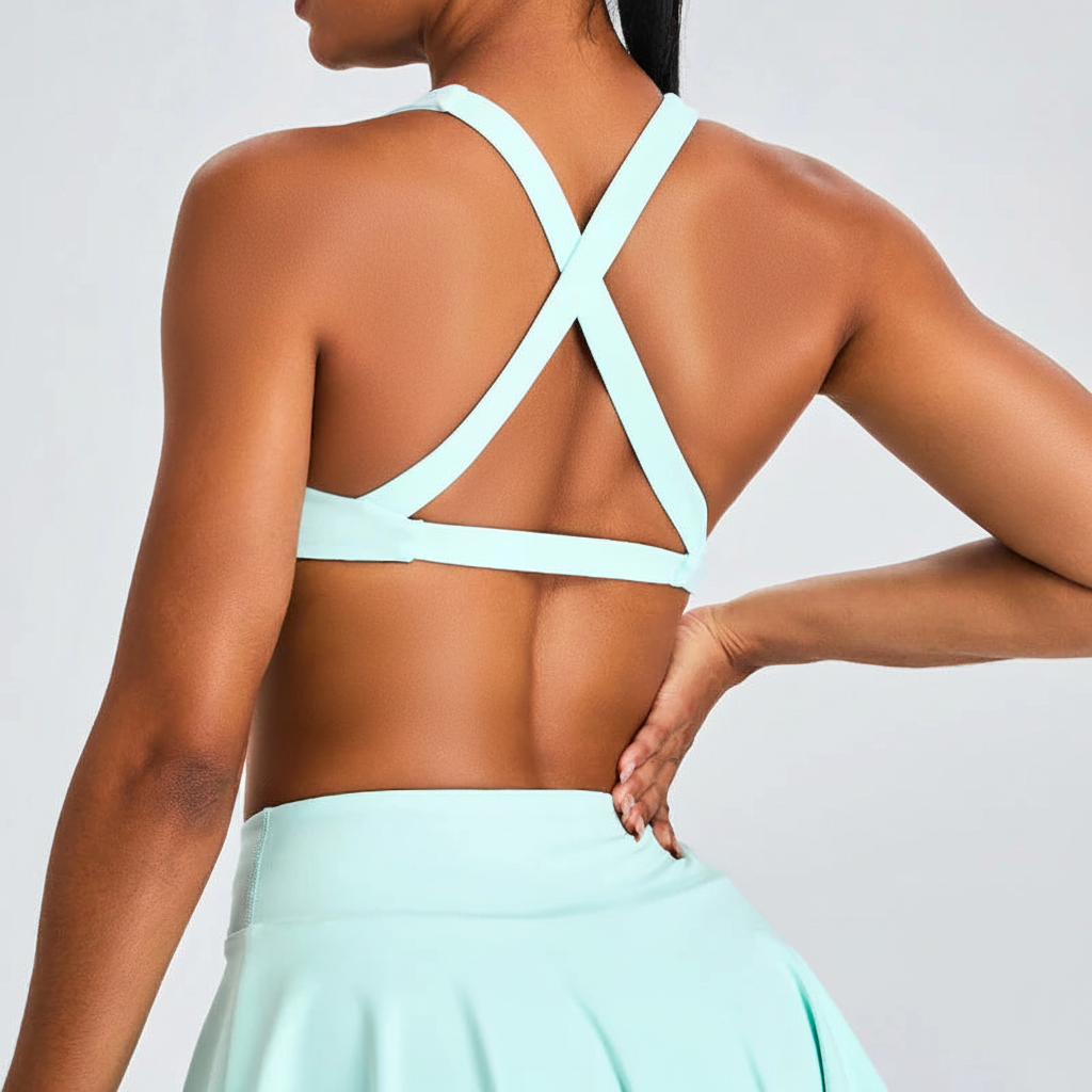 Back – mint cross-back sports bra with face