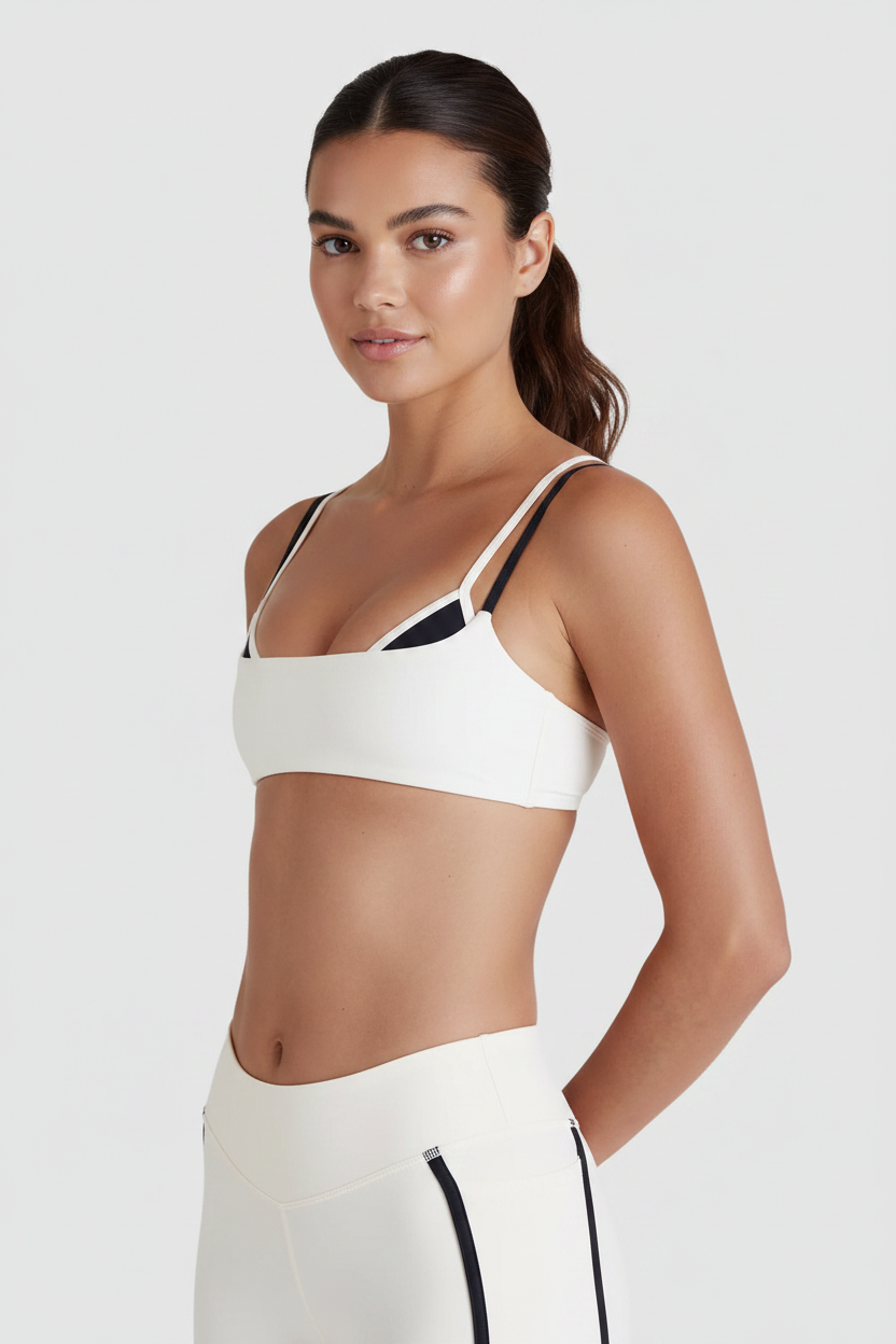 Model with face – white sports bra
